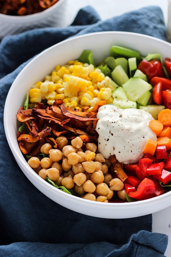 Vegan Cobb Salad with Cashew Dill Dressing in a white bowl. 