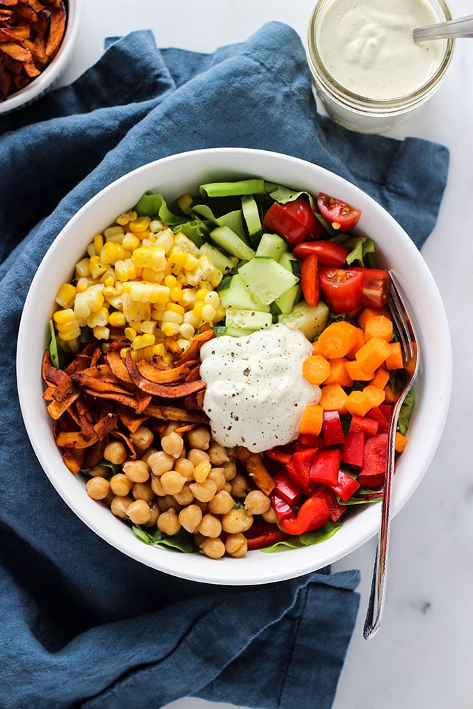 Vegan Cobb Salad with Cashew Dill Dressing in a bowl next to a white napkin. 