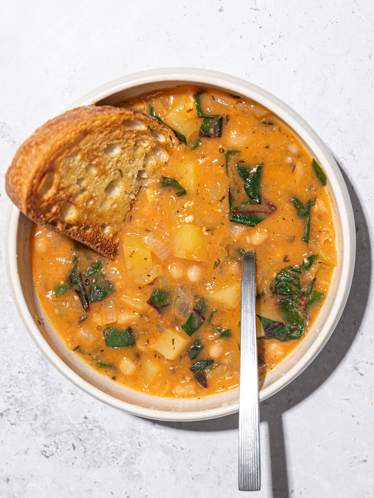 Filling White Bean Stew with Potatoes and Greens